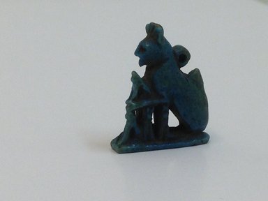  <em>Cat with Kittens as Amulet</em>. Faience, 7/8 x 13/16 in. (2.3 x 2.1 cm). Brooklyn Museum, Gift of Evangeline Wilbour Blashfield, Theodora Wilbour, and Victor Wilbour honoring the wishes of their mother, Charlotte Beebe Wilbour, as a memorial to their father Charles Edwin Wilbour, 16.580.6. Creative Commons-BY (Photo: Brooklyn Museum, CUR.16.580.6_view4.jpg)
