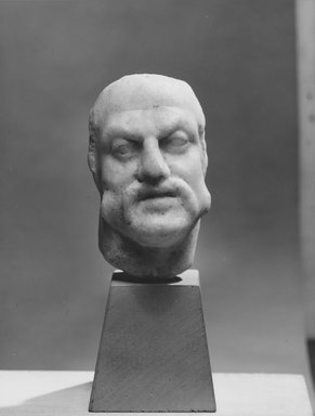 Roman. <em>Male Head</em>, 3rd century C.E. probably. Marble, 3 1/4 x 2 1/16 x 2 7/16 in. (8.2 x 5.3 x 6.2 cm). Brooklyn Museum, Gift of Evangeline Wilbour Blashfield, Theodora Wilbour, and Victor Wilbour honoring the wishes of their mother, Charlotte Beebe Wilbour, as a memorial to their father, Charles Edwin Wilbour, 16.580.78. Creative Commons-BY (Photo: Brooklyn Museum, CUR.16.580.78_NegA_print_bw.jpg)