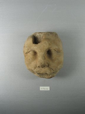 Graeco-Egyptian. <em>Fragmentary Face</em>, 145–30 B.C.E. Marble, 5 1/16 x 4 13/16 x 3 7/8 in. (12.8 x 12.2 x 9.8 cm). Brooklyn Museum, Gift of Evangeline Wilbour Blashfield, Theodora Wilbour, and Victor Wilbour honoring the wishes of their mother, Charlotte Beebe Wilbour, as a memorial to their father, Charles Edwin Wilbour, 16.580.88. Creative Commons-BY (Photo: Brooklyn Museum, CUR.16.580.88_view1.jpg)