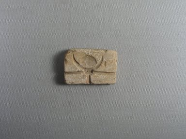  <em>Lunar Disk and Crescent  Amulet Mold</em>, ca. 1353-1292 B.C.E. Limestone, 1 5/8 × 9/16 × 2 7/16 in. (4.2 × 1.4 × 6.2 cm). Brooklyn Museum, Gift of Evangeline Wilbour Blashfield, Theodora Wilbour, and Victor Wilbour honoring the wishes of their mother, Charlotte Beebe Wilbour, as a memorial to their father, Charles Edwin Wilbour, 16.606. Creative Commons-BY (Photo: , CUR.16.606_view01.jpg)