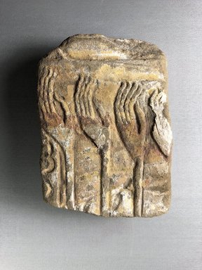  <em>Relief Fragment of Four Rays of the Sun</em>, ca. 1352-1336 B.C.E. Sandstone, pigment, 7 1/16 x 4 15/16 x 6 11/16 in. (18 x 12.5 x 17 cm). Brooklyn Museum, Gift of Evangeline Wilbour Blashfield, Theodora Wilbour, and Victor Wilbour honoring the wishes of their mother, Charlotte Beebe Wilbour, as a memorial to their father, Charles Edwin Wilbour, 16.65. Creative Commons-BY (Photo: , CUR.16.65_view01.jpg)
