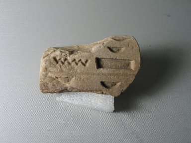  <em>Corner of a Statue Base with a Princess Titulary</em>, ca. 1352-1336 B.C.E. Quartzite, 2 1/4 x 2 1/2 x 3 3/4 in. (5.7 x 6.3 x 9.5 cm). Brooklyn Museum, Gift of Evangeline Wilbour Blashfield, Theodora Wilbour, and Victor Wilbour honoring the wishes of their mother, Charlotte Beebe Wilbour, as a memorial to their father, Charles Edwin Wilbour, 16.662. Creative Commons-BY (Photo: Brooklyn Museum, CUR.16.662_view01.jpg)