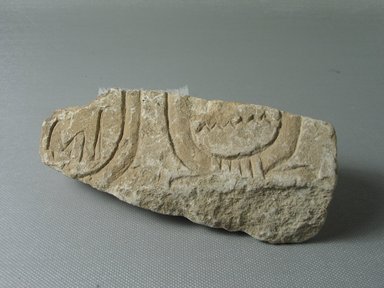  <em>Relief Fragment with Cartouches of Akhenaten and Nefertiti</em>, ca. 1352-1336 B.C.E. Soft limestone, 2 1/16 x 5 5/8 in. (5.2 x 14.3 cm). Brooklyn Museum, Gift of Evangeline Wilbour Blashfield, Theodora Wilbour, and Victor Wilbour honoring the wishes of their mother, Charlotte Beebe Wilbour, as a memorial to their father, Charles Edwin Wilbour, 16.666. Creative Commons-BY (Photo: Brooklyn Museum, CUR.16.666_view01.jpg)