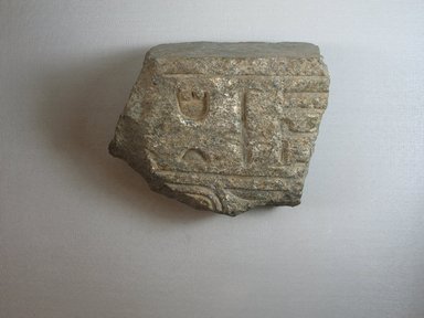 <em>Edge of a Statue Base</em>, ca. 1352-1336 B.C.E. Granite, 5 7/8 x 3 15/16 x 7 7/16 in. (14.9 x 10 x 18.9 cm). Brooklyn Museum, Gift of Evangeline Wilbour Blashfield, Theodora Wilbour, and Victor Wilbour honoring the wishes of their mother, Charlotte Beebe Wilbour, as a memorial to their father, Charles Edwin Wilbour, 16.674. Creative Commons-BY (Photo: Brooklyn Museum, CUR.16.674_view3.jpg)
