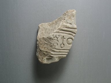  <em>Relief Fragment with Cartouche of Akhenaten</em>, ca. 1352–1336 B.C.E. Soft limestone, pigment, 4 13/16 x 2 3/4 in. (12.3 x 7 cm). Brooklyn Museum, Gift of Evangeline Wilbour Blashfield, Theodora Wilbour, and Victor Wilbour honoring the wishes of their mother, Charlotte Beebe Wilbour, as a memorial to their father, Charles Edwin Wilbour, 16.697. Creative Commons-BY (Photo: Brooklyn Museum, CUR.16.697_view01.jpg)