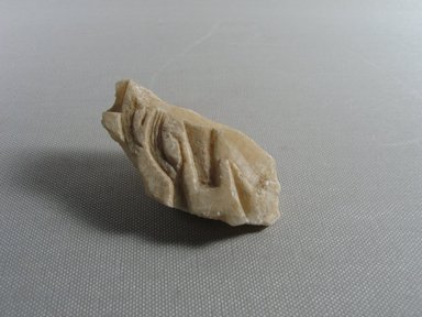  <em>Relief Fragment of an Offering to the Aten</em>, ca. 1352-1336 B.C.E. Egyptian alabaster (calcite), 1 15/16 × 2 1/2 × 1 1/8 in. (4.9 × 6.4 × 2.9 cm). Brooklyn Museum, Gift of Evangeline Wilbour Blashfield, Theodora Wilbour, and Victor Wilbour honoring the wishes of their mother, Charlotte Beebe Wilbour, as a memorial to their father, Charles Edwin Wilbour, 16.703. Creative Commons-BY (Photo: , CUR.16.703_view01.jpg)