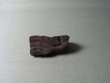  <em>Relief Fragment</em>, ca. 1352-1336 B.C.E. Quartzite, 2 11/16 × 1 5/16 × 1 1/4 in. (6.8 × 3.4 × 3.1 cm). Brooklyn Museum, Gift of Evangeline Wilbour Blashfield, Theodora Wilbour, and Victor Wilbour honoring the wishes of their mother, Charlotte Beebe Wilbour, as a memorial to their father, Charles Edwin Wilbour, 16.704. Creative Commons-BY (Photo: , CUR.16.704_view01.jpg)