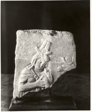 Graeco-Egyptian. <em>Fragment with Figure</em>, 30 B.C.E-395 C.E. Marble, 6 5/8 × 5 5/16 × 1 11/16 in. (16.9 × 13.5 × 4.3 cm). Brooklyn Museum, Gift of Evangeline Wilbour Blashfield, Theodora Wilbour, and Victor Wilbour honoring the wishes of their mother, Charlotte Beebe Wilbour, as a memorial to their father, Charles Edwin Wilbour, 16.87. Creative Commons-BY (Photo: Brooklyn Museum, CUR.16.87_negA_bw.jpg)
