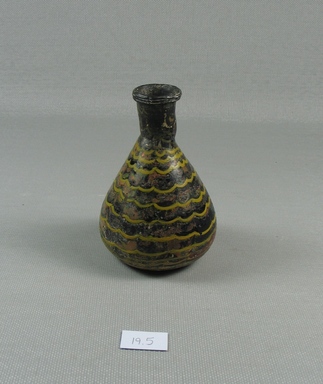 Islamic. <em>Large Egyptian Amphora</em>, 8th-9th century C.E. Glass, paint, 3 13/16 x Diam. 2 5/16 in. (9.7 x 5.8 cm). Brooklyn Museum, Robert B. Woodward Memorial Fund, 19.5. Creative Commons-BY (Photo: Brooklyn Museum, CUR.19.5_view1.jpg)