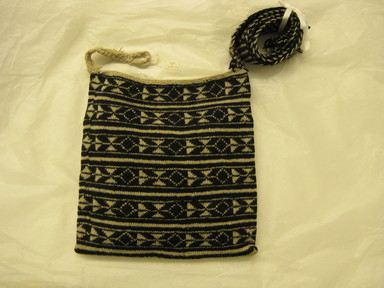  <em>Knitted Bag</em>, 20th century. Wool, Bag only: 11 3/4 × 11 1/4 × 2 1/8 in. (29.8 × 28.6 × 5.4 cm), not including strap. Brooklyn Museum, Gift in memory of Arthur W. Clement, 1989.168.50. Creative Commons-BY (Photo: , CUR.1989.168.50.jpg)