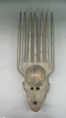 Bamana. <em>N'tomo Mask</em>, 20th century. Wood, metal, 23 x 8 1/4 x 5 1/2 in. (58.4 x 21 x 14 cm). Brooklyn Museum, The Adolph and Esther D. Gottlieb Collection, 1989.51.54. Creative Commons-BY (Photo: Brooklyn Museum, CUR.1989.51.54_front.jpg)