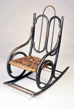 Attributed to Tyler Desk Company. <em>Child's Bentwood Rocking Chair</em>, ca. 1885. Ebonized bentwood, original upholstery, 28 1/8 x 14 x 25 1/4 in. (71.4 x 35.6 x 64.1 cm). Brooklyn Museum, Gift of Joseph V. Garry, 1989.60.2. Creative Commons-BY (Photo: Brooklyn Museum, CUR.1989.60.2.jpg)