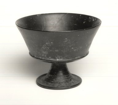 Etruscan. <em>Chalice in Buccero</em>, 6th century B.C.E. Clay, slip, 3 5/8 × Diam. 4 13/16 in. (9.2 × 12.2 cm). Brooklyn Museum, The Adolph and Esther D. Gottlieb Collection, 1989.76. Creative Commons-BY (Photo: Brooklyn Museum, CUR.1989.76_print_NegC_bw.jpg)