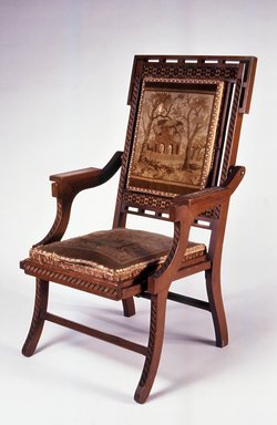 Edward W. Vaill (1861–1891). <em>Folding Armchair (reception) (Aesthetic Movement style)</em>, ca. 1880. Walnut, original upholstery, metal, 39 7/16 x 24 9/16 x 25 3/4 in. (100.2 x 62.4 x 65.4 cm). Brooklyn Museum, Bequest of DeLancey Thorn Grant in memory of her mother, Louise Floyd-Jones Thorn, by exchange, 1991.199. Creative Commons-BY (Photo: Brooklyn Museum, CUR.1991.199.jpg)