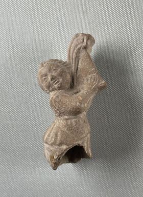  <em>Figure of a Youth Playing a Harp</em>, 1st-3rd century C.E. Terracotta, 3 9/16 × 1 13/16 × 1 1/4 in. (9 × 4.6 × 3.2 cm). Brooklyn Museum, Gift of Lloyd and Jeanne Raport, 1991.262.2. Creative Commons-BY (Photo: Brooklyn Museum, CUR.1991.262.2_view01.jpg)