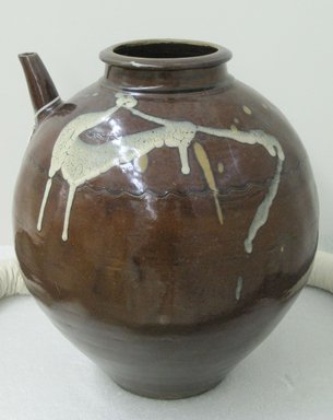  <em>Sake Urn</em>, 19th century. Glazed stoneware: Koishiwara or Onta ware, height: 14 1/2 in. Brooklyn Museum, Gift of the Estate of Charles A. Brandon, 1991.74.39. Creative Commons-BY (Photo: Brooklyn Museum, CUR.1991.74.39.jpg)