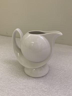 Erich Rozewicz (French, born Poland, 20th century). <em>Creamer from a Three Piece Tea Set, Monoikos Pattern</em>, ca. 1990. Porcelain, 4 1/8 x 4 3/4 x 2 3/4 in.  (10.5 x 12.1 x 7.0 cm). Brooklyn Museum, Gift of Erich Rozewicz and Manufacture de Monaco, 1992.244.3. Creative Commons-BY (Photo: , CUR.1992.244.3.jpg)
