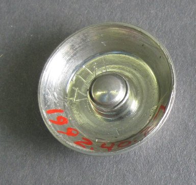 Marion Anderson Noyes (American, 1907-2002). <em>Miniature Candle Holder</em>. Pewter, diam: 13/16 in. (2.1 cm). Brooklyn Museum, Gift of Marion Anderson Noyes, 1992.40.27. Creative Commons-BY (Photo: Brooklyn Museum, CUR.1992.40.27_view2.jpg)