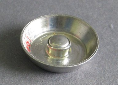 Marion Anderson Noyes (American, 1907-2002). <em>Miniature Candle Holder</em>. Pewter, diam: 13/16 in. (2.1 cm). Brooklyn Museum, Gift of Marion Anderson Noyes, 1992.40.28. Creative Commons-BY (Photo: Brooklyn Museum, CUR.1992.40.28_view1.jpg)
