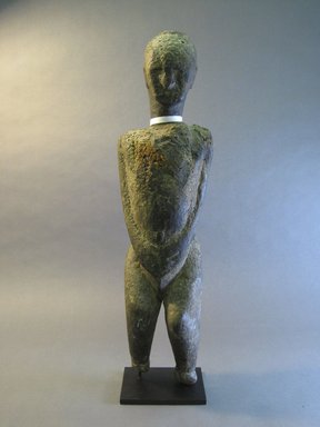 Dogon. <em>Standing Female Figure</em>, late 19th or early 20th century. Wood, organic sacrificial material, 24 x 6 x 5 1/2 in. (60.0 x 15.2 x 14.0 cm). Brooklyn Museum, Gift of Marc and Ruth Franklin in memory of Alfie Scheinberg, 1992.68. Creative Commons-BY (Photo: Brooklyn Museum, CUR.1992.68_front.jpg)