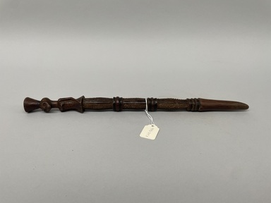 Ndengese. <em>Staff</em>, 20th century. Wood, 15 5/8 x 1 1/8 x 1 1/4 in. (39.7 x 2.9 x 3.2 cm). Brooklyn Museum, Gift of Drs. Israel and Michaela Samuelly, 1992.75.1. Creative Commons-BY (Photo: Brooklyn Museum, CUR.1992.75.1_overall01.jpeg)