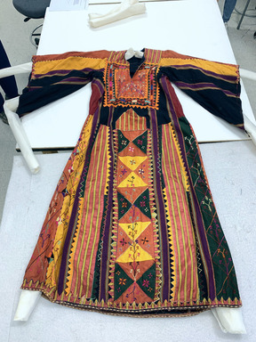 Bedouin. <em>Woman's Robe</em>. Cotton, atlas silk, and silk embroidery, 54 3/4 × 48 1/16 in. (139 × 122 cm). Brooklyn Museum, Gift of Mr. and Mrs. J. Garrison Stradling, 1992.79.1. Creative Commons-BY (Photo: Brooklyn Museum, CUR.1992.79.1_front.JPG)