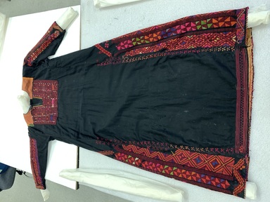 Bedouin. <em>Woman's Robe</em>. Cotton, atlas silk, and silk embroidery, 58 1/4 × 52 3/4 in. (148 × 134 cm). Brooklyn Museum, Gift of Mr. and Mrs. J. Garrison Stradling, 1992.79.2. Creative Commons-BY (Photo: Brooklyn Museum, CUR.1992.79.2_front.JPG)