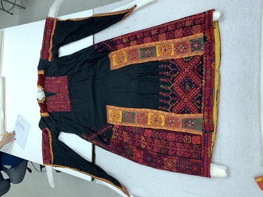 Bedouin. <em>Woman's Robe</em>. Polished cotton, velvet, silk, sequins, cotton(?) embroidery, 53 15/16 × 47 1/4 in. (137 × 120 cm). Brooklyn Museum, Gift of Mr. and Mrs. J. Garrison Stradling, 1992.79.4. Creative Commons-BY (Photo: Brooklyn Museum, CUR.1992.79.4_front.JPG)