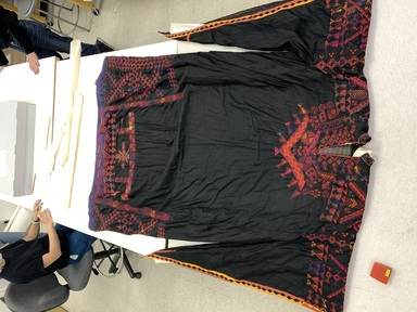 Bedouin. <em>Woman's Robe</em>. Cotton, atlas silk, and silk embroidery, 64 15/16 × 50 3/8 in. (165 × 128 cm). Brooklyn Museum, Gift of Mr. and Mrs. J. Garrison Stradling, 1992.79.5. Creative Commons-BY (Photo: Brooklyn Museum, CUR.1992.79.5_front.JPG)