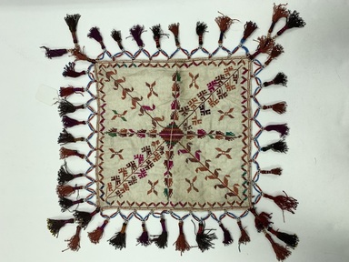 Palestinian. <em>Wedding handkerchief</em>. Cotton, silk tassels, beads, 21 1/4 × 22 7/16 in. (54 × 57 cm). Brooklyn Museum, Gift of Mr. and Mrs. J. Garrison Stradling, 1992.79.6. Creative Commons-BY (Photo: Brooklyn Museum, CUR.1992.79.6.JPG)
