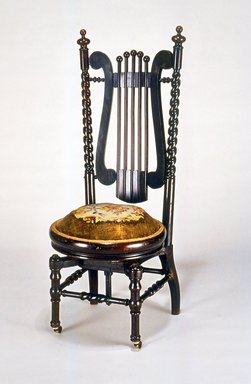 George Jacob Hunzinger (American, born Germany, 1835-1898). <em>Piano Chair</em>, ca. 1888-1890. Stained wood, metal, textile, 46 1/2 x 18 x 22 in. (118.1 x 45.7 x 55.9 cm). Brooklyn Museum, Purchased with funds given by Joseph V. Garry, 1993.34a-b. Creative Commons-BY (Photo: Brooklyn Museum, CUR.1993.34a-b.jpg)