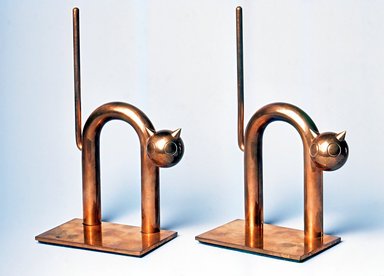 Walter von Nessen (American, born Germany, 1889–1943). <em>Cat Bookend, One of Pair</em>, 1930–1935. Copper-plated alloy, 7 3/8 x 4 1/2 x 2 1/2 in. (18.8 x 11.5 x 6.4 cm). Brooklyn Museum, H. Randolph Lever Fund, 1994.156.5. Creative Commons-BY (Photo: , CUR.1994.156.4-5.jpg)