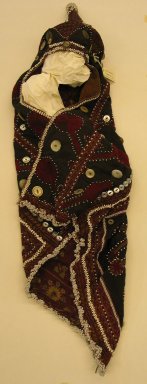  <em>Hat</em>, mid-20th century. Cotton cloth, buttons, coins, and beads Brooklyn Museum, Gift of Dr. and Mrs. John P. Lyden, 1994.197.7. Creative Commons-BY (Photo: Brooklyn Museum, CUR.1994.197.7.jpg)