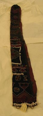  <em>Braid Cover</em>, mid-20th century. Cotton cloth, beads Brooklyn Museum, Gift of Dr. and Mrs. John P. Lyden, 1994.197.8. Creative Commons-BY (Photo: Brooklyn Museum, CUR.1994.197.8.jpg)