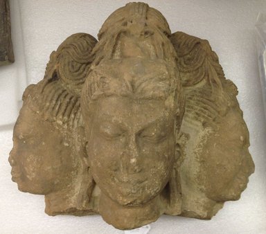  <em>Head of Brahma</em>, 7th century. Tan sandstone, 12 1/2 x 14 1/2 x 8 in.  (31.8 x 36.8 x 20.3 cm). Brooklyn Museum, Gift of Mr. and Mrs. Paul E. Manheim, 1994.199.2. Creative Commons-BY (Photo: Brooklyn Museum, CUR.1994.199.2_overall.jpg)