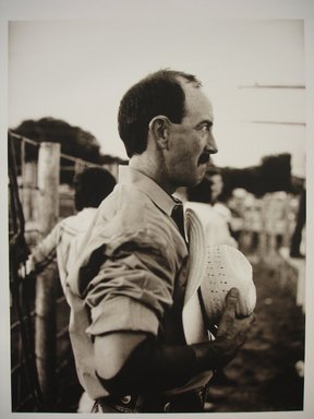 Jill Mathis (American, born 1964). <em>[Untitled] (Rodeo Cowboy with Hat in Hand)</em>, 1993. Selenium-toned gelatin silver print, sheet: 14 × 10 3/4 in. (35.6 × 27.3 cm). Brooklyn Museum, Gift of Ralph Gibson, 1995.127.1. © artist or artist's estate (Photo: Brooklyn Museum, CUR.1995.127.1.jpg)