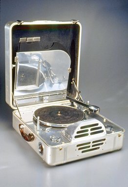 John Vassos (American, born Romania, 1898–1985). <em>RCA Victor Special Model K, Portable Electric Phonograph</em>, ca. 1935. Aluminum, various metals, plastic, felt, leather, closed: 7 3/4 x 16 1/4 x 17 1/4 in. (19.7 x 41.3 x 43.8 cm). Brooklyn Museum, Gift of Benno Bordiga, by exchange, 1995.14. Creative Commons-BY (Photo: Brooklyn Museum, CUR.1995.14.jpg)