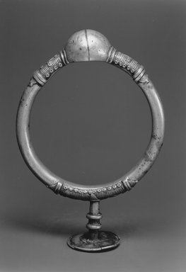 Lobi. <em>Neck Ring in Two Pieces</em>, 19th century. Copper alloy, 7 1/2 x 5 3/8in. (19.1 x 13.7cm). Brooklyn Museum, Gift of Allen C. Davis, 1995.171.10a-b. Creative Commons-BY (Photo: Brooklyn Museum, CUR.1995.171.10a-b_print_view1_bw.jpg)