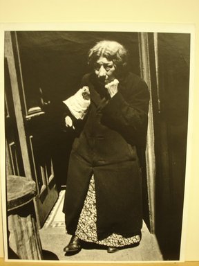 Leon Levinstein (American, 1910-1988). <em>[Untitled] (Irish-American Woman near 10th Avenue)</em>, 1952; printed 1970. Gelatin silver photograph, 13 1/4 x 10 7/8 in. (33.6 x 27.5 cm). Brooklyn Museum, Gift of Stuart Karu, 1995.209.15. © artist or artist's estate (Photo: Brooklyn Museum, CUR.1995.209.15.jpg)