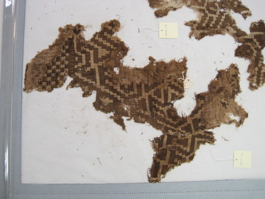  <em>Textile Fragments, Undetermined</em>, 1400-1700. Cotton, a: 14 1/2 × 20 1/4 in. (36.8 × 51.4 cm). Brooklyn Museum, Gift of Kay Hodnett Nunez, 1995.47.16a-b. Creative Commons-BY (Photo: Brooklyn Museum, CUR.1995.47.16a-b_view01.jpg)