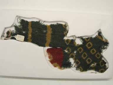 Coastal Wari. <em>Tunic, Fragment</em>, 600-1400. Camelid fiber, (26.0 x 11.0 cm). Brooklyn Museum, Gift of Kay Hodnett Nunez, 1995.47.80. Creative Commons-BY (Photo: Brooklyn Museum, CUR.1995.47.80.jpg)