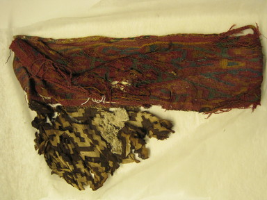 Ica /Palpa. <em>Tunic, Fragments</em>, 1000-1400. Cotton, camelid fiber, a: 7 3/4 × 25 1/4 in. (19.7 × 64.1 cm). Brooklyn Museum, Gift of Kay Hodnett Nunez, 1995.47.92a-b. Creative Commons-BY (Photo: , CUR.1995.47.92a-b_view01.jpg)