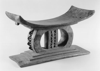 Akan. <em>Stool</em>, early 20th century. Wood, paint, 14 X 24 1/4 X 12 1/2 in. (35.6 X 61.6 X 31.8 cm). Brooklyn Museum, Gift of Bill and Gale Simmons, 1996.117.8. Creative Commons-BY (Photo: Brooklyn Museum, CUR.1996.117.8_print_bw.jpg)