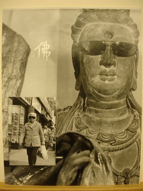 Nina Kuo (American, born 1952). <em>Buddha Smile (On East Broadway, N.Y.C. Chinatown)</em>, 1993. Gelatin silver print, Image/Sheet: 14 x 10 3/4 in. (35.6 x 27.4 cm). Brooklyn Museum, Gift of Agnes Kuo, 1996.194.1. © artist or artist's estate (Photo: Brooklyn Museum, CUR.1996.194.1.jpg)
