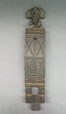 Bamana. <em>Rectangular Door Lock</em>, 19th or 20th century. Wood, 22 3/4 x 4 1/4 x 2 1/4 in. (48.2 x 11.4 x 11.1 cm). Brooklyn Museum, Gift of Eugene and Harriet Becker, 1996.196.2. Creative Commons-BY (Photo: Brooklyn Museum, CUR.1996.196.2.jpg)