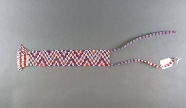 Possibly Xhosa. <em>Neck Ornament (Love Letter)</em>, late 19th century. Glass seed beads, fiber, 15 x 2 1/2 in. (38.1 x 6.4 cm). Brooklyn Museum, Gift of Mr. and Mrs. Lee Lorenz, 1996.202.14. Creative Commons-BY (Photo: Brooklyn Museum, CUR.1996.202.14_overall.jpg)