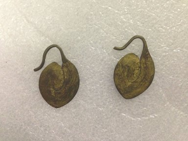 Turkana. <em>Pair of Earrings (Akaparaparet)</em>, mid-20th century. Copper alloy, 2 x 1 1/4 in. (5.1 x 3.2 cm). Brooklyn Museum, Gift of Donna Klumpp Pido, 1996.204.10a-b. Creative Commons-BY (Photo: Brooklyn Museum, CUR.1996.204.10a-b_overall.jpg)