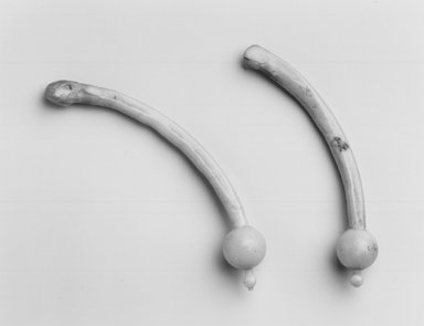 Samburu. <em>Pair of Ear Sticks</em>, mid-20th century. Metal, wood, 1 1/8 x 13/16 in. (2.9 x 2.1 cm). Brooklyn Museum, Gift of Donna Klumpp Pido, 1996.204.26a-b. Creative Commons-BY (Photo: Brooklyn Museum, CUR.1996.204.26a-b_print_bw.jpg)