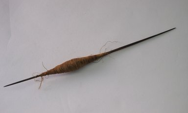  <em>Spindle and Thread</em>, 1000-1476 C.E. Wood, cotton?, camelid fiber?, 1/2 x 1/2 x 9 5/8 in. (1.3 x 1.3 x 24.4 cm). Brooklyn Museum, Gift of Morris De Camp Crawford, Jr., 1997.104.4a-b. Creative Commons-BY (Photo: Brooklyn Museum, CUR.1997.104.4a-b.jpg)