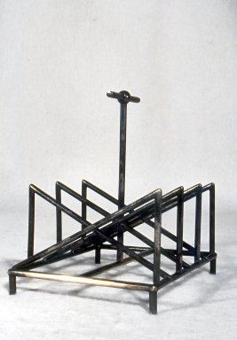 Christopher Dresser (English, 1834–1904). <em>Toast Rack</em>, ca. 1880. Silverplate, 5 3/8 x 5 1/4 x 4 1/4 in. (13.7 x 13.3 x 10.8 cm). Brooklyn Museum, Gift of Marie Bernice Bitzer, by exchange, 1997.114. Creative Commons-BY (Photo: Brooklyn Museum, CUR.1997.114.jpg)